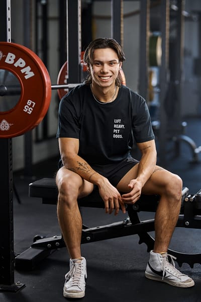 Friendly trainer motivating a client to reach their fitness goals at BPM Fitness Centre.