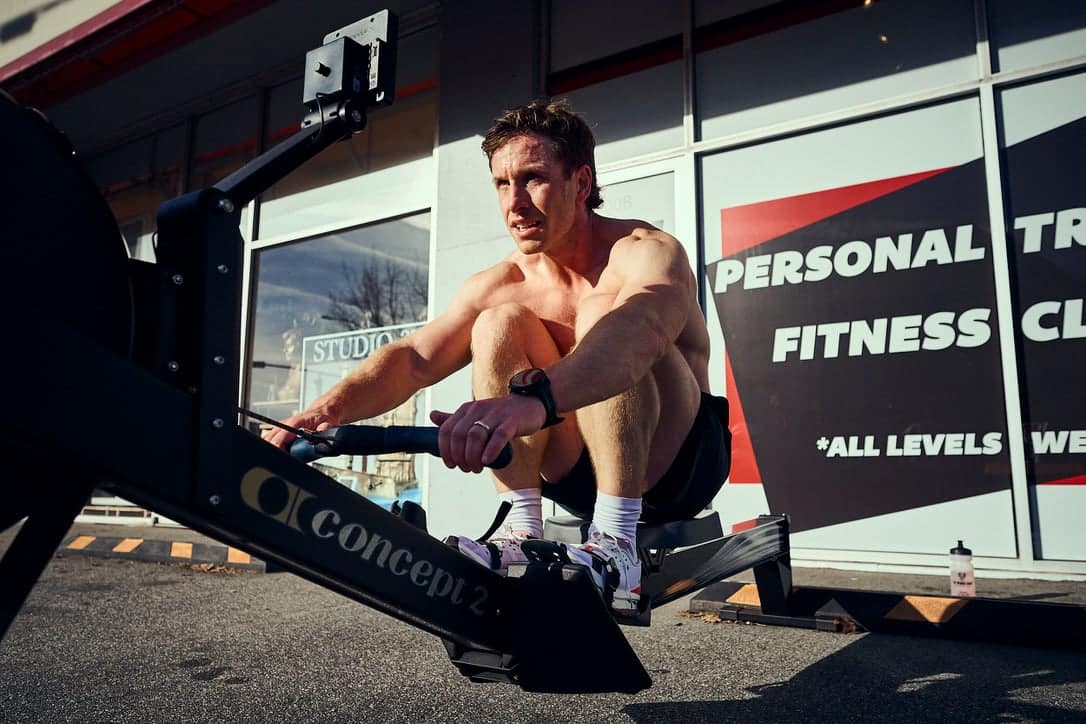 A HYROX athlete on a Concept 2 ergometer