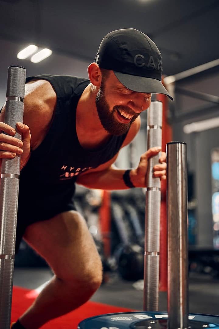 HYROX athlete pushing a sled at BPM Fitness Centre in Victoria BC